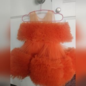Customized Baby dress in bright orange with off shoulders..New, never wore